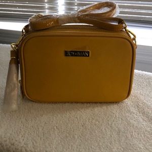 Brand new Joy and Iman bag leather